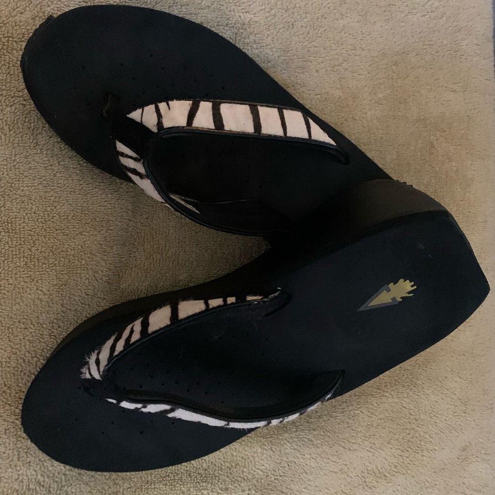 Volatile black and white zebra leather size 10